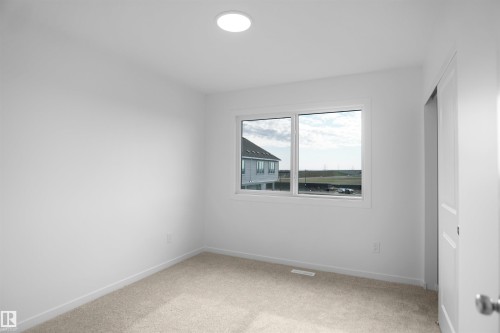 43 1009 Cy Becker Road, Edmonton, AB - Indoor Photo Showing Other Room