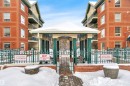 Snow covered property featuring a view of apartment building / complex - 203 35 Sir Winston Churchill Avenue, St. Albert, AB  - Outdoor 