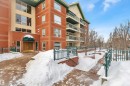 Snow covered property featuring a view of apartment building / complex - 203 35 Sir Winston Churchill Avenue, St. Albert, AB  - Outdoor 