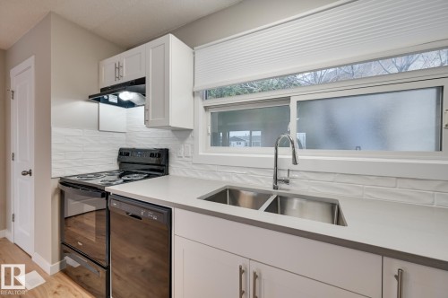 14903 77 Street, Edmonton, AB - Indoor Photo Showing Kitchen With Double Sink