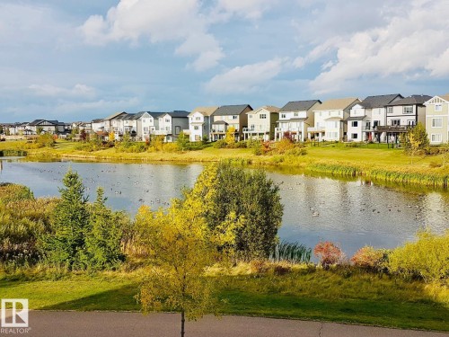 Lake backing view. - 5441 Allbright Square Square, Edmonton, AB - Outdoor With Body Of Water With View