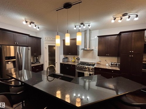 6105 17A Avenue, Edmonton, AB - Indoor Photo Showing Kitchen With Double Sink With Upgraded Kitchen