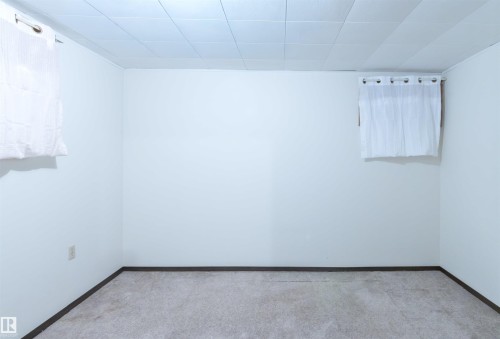 Bedroom featuring baseboards - 9305 151 Street, Edmonton, AB - Indoor Photo Showing Other Room