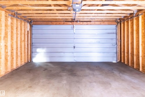 Garage with a garage door opener - 9305 151 Street, Edmonton, AB - Indoor Photo Showing Garage