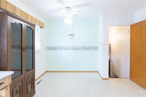 Dining area with light floors and ceiling fan - 9305 151 Street, Edmonton, AB - Indoor Photo Showing Other Room
