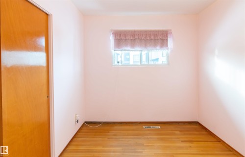 Bedroom featuring light wood-style flooring - 9305 151 Street, Edmonton, AB - Indoor Photo Showing Other Room