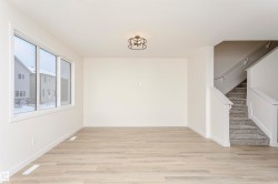 Empty room with light wood finished floors - 