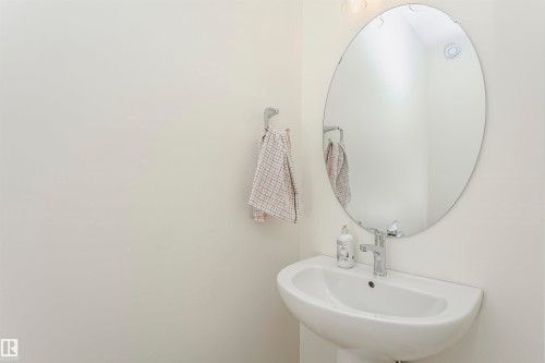 Bathroom with a sink - 5111 Kinney Way Sw, Edmonton, AB - Indoor Photo Showing Bathroom