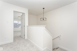 Staircase with carpet and baseboards - 