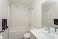 Full bathroom with vanity and bathtub / shower combination - 