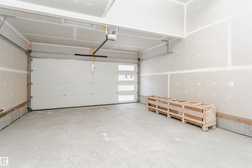 View of garage - 5111 Kinney Way Sw, Edmonton, AB - Indoor Photo Showing Garage