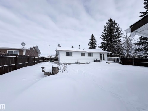 Snow covered property with french doors - 4602 42 Avenue, Bonnyville Town, AB - Outdoor