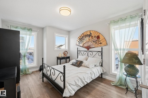 Bedroom featuring wood finished floors - 7803 Yorke Road, Edmonton, AB - Indoor Photo Showing Bedroom