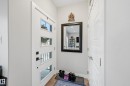 Doorway with wood finished floors - 7803 Yorke Road, Edmonton, AB  - Indoor Photo Showing Other Room 