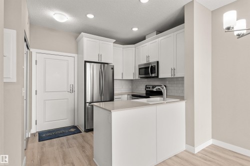 412 12804 140 Avenue, Edmonton, AB - Indoor Photo Showing Kitchen With Stainless Steel Kitchen