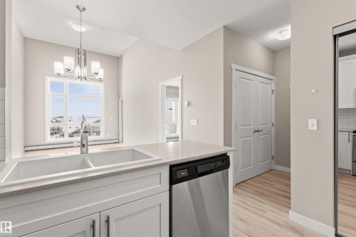 412 12804 140 Avenue, Edmonton, AB - Indoor Photo Showing Kitchen With Double Sink