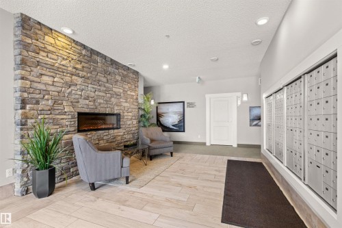 412 12804 140 Avenue, Edmonton, AB - Indoor With Fireplace