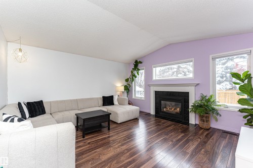 58 Durocher Street, St. Albert, AB - Indoor Photo Showing Living Room With Fireplace
