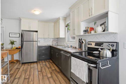 10840 74 Avenue, Edmonton, AB - Indoor Photo Showing Kitchen With Stainless Steel Kitchen With Double Sink