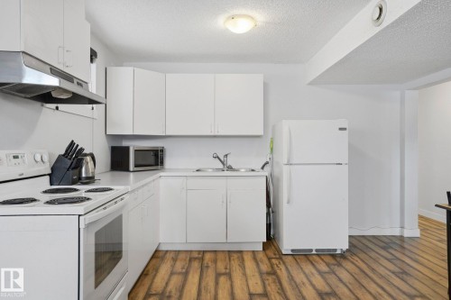10840 74 Avenue, Edmonton, AB - Indoor Photo Showing Kitchen With Double Sink
