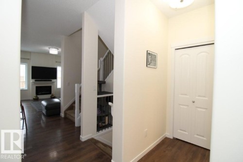 3043 Checknita Way, Edmonton, AB - Indoor Photo Showing Other Room With Fireplace