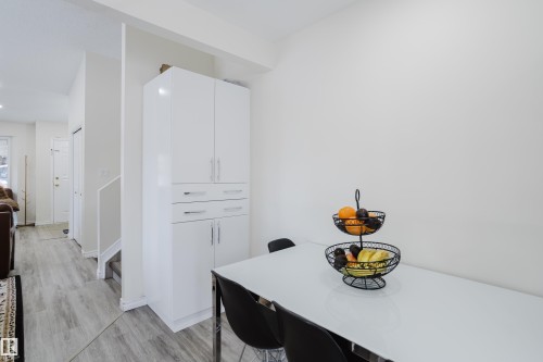 Dining area with light wood-style floors and recessed lighting - 236 Lago Lindo Crescent, Edmonton, AB 