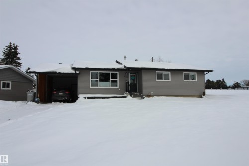 View of snow covered back of property - 10319 106 Ave, Westlock, AB - Outdoor