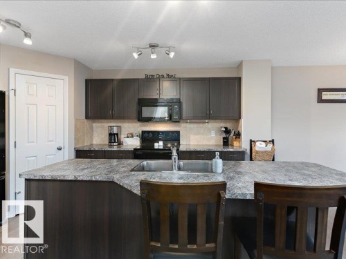 13434 166 Avenue, Edmonton, AB - Indoor Photo Showing Kitchen With Double Sink