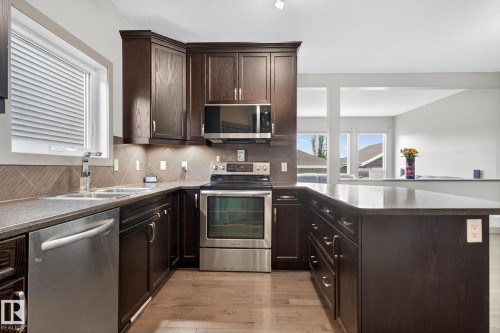 5514 Crabapple Loop, Edmonton, AB - Indoor Photo Showing Kitchen With Double Sink
