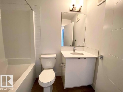 Full bathroom with vanity and tub / shower combination - 10 446 Allard Boulevard, Edmonton, AB - Indoor Photo Showing Bathroom