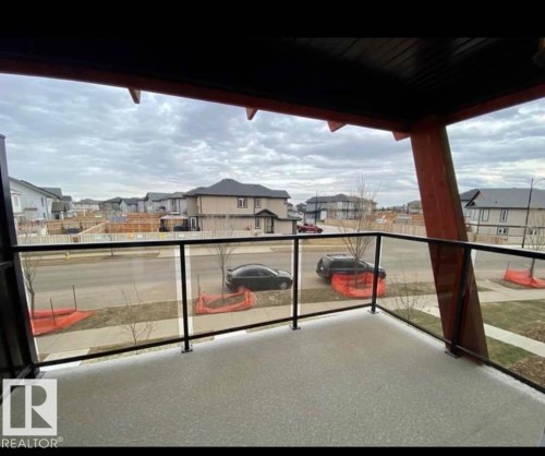 Balcony with a residential view - 10 446 Allard Boulevard, Edmonton, AB - Outdoor