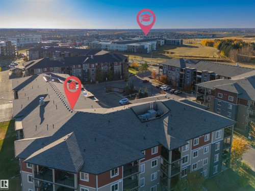 View of urban area featuring apartment complex - 206 3207 James Mowatt Trail, Edmonton, AB - Outdoor With View