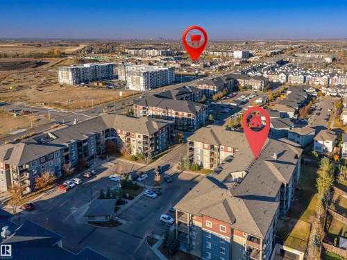 View of property location with nearby urban area - 206 3207 James Mowatt Trail, Edmonton, AB - Outdoor With View
