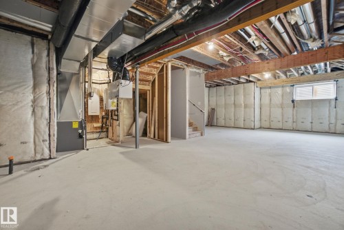 Basement with electric panel and heating unit - 2408 208 Street, Edmonton, AB - Indoor Photo Showing Basement