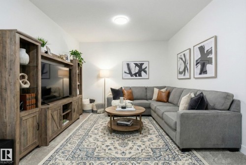 Living area featuring light carpet - 2408 208 Street, Edmonton, AB - Indoor Photo Showing Living Room