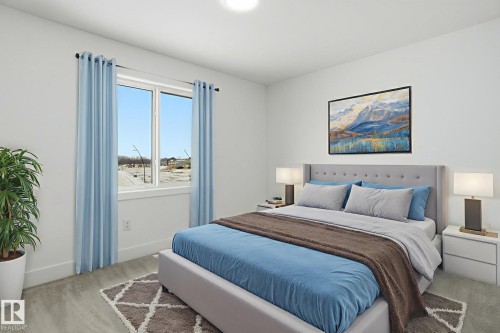 Carpeted bedroom featuring baseboards - 2408 208 Street, Edmonton, AB - Indoor Photo Showing Bedroom