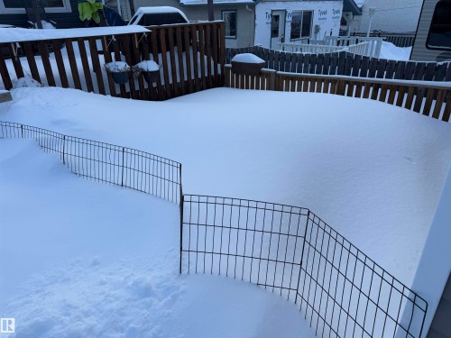 View of yard layered in snow - 4506 53 Avenue, Barrhead, AB - Outdoor