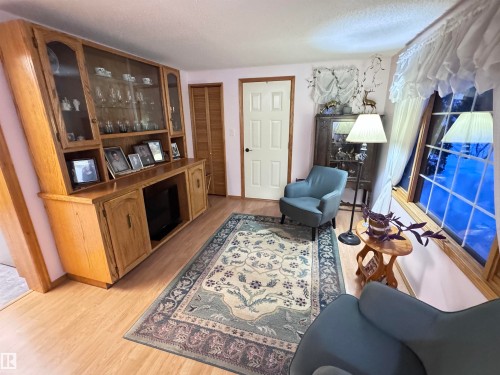 5309 51 Street, Jarvie, AB - Indoor With Fireplace