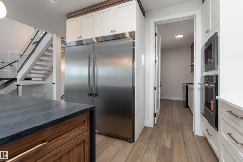 7077 Kiviaq Crescent, Edmonton, AB - Indoor Photo Showing Kitchen With Stainless Steel Kitchen