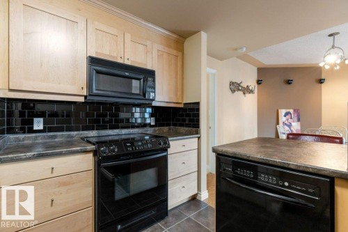 308 9020 Jasper Avenue, Edmonton, AB - Indoor Photo Showing Kitchen