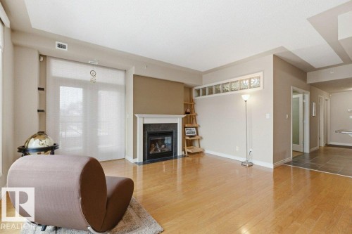 308 9020 Jasper Avenue, Edmonton, AB - Indoor With Fireplace