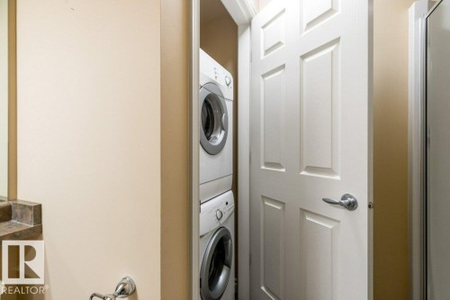308 9020 Jasper Avenue, Edmonton, AB - Indoor Photo Showing Laundry Room