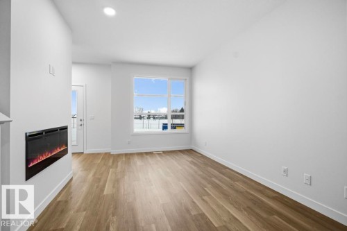 8636 Edgemont Link, Edmonton, AB - Indoor With Fireplace