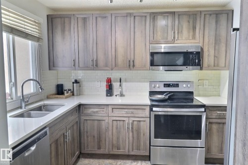 18285 84 Avenue, Edmonton, AB - Indoor Photo Showing Kitchen With Double Sink