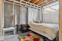 Bedroom with finished concrete flooring - 