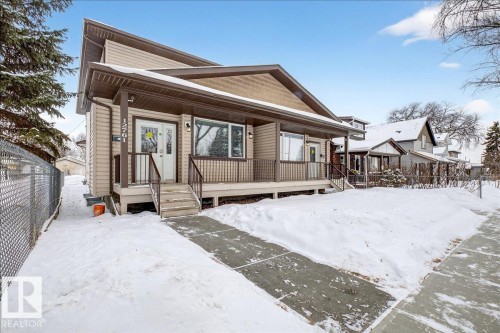 Snow covered property - 12761 119 St, Edmonton, AB - Outdoor With Deck Patio Veranda