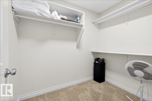 Walk in closet featuring carpet - 12761 119 St, Edmonton, AB - Indoor With Storage