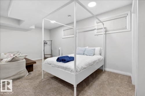 Bedroom with carpet floors and recessed lighting - 12761 119 St, Edmonton, AB - Indoor Photo Showing Bedroom