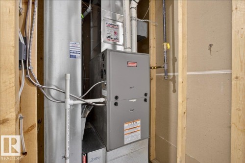 Utilities with heating unit - 12761 119 St, Edmonton, AB - Indoor Photo Showing Basement