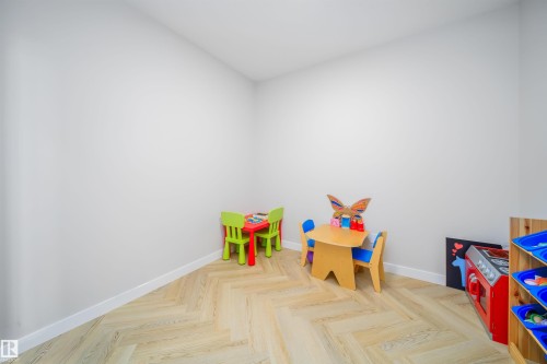 Game room featuring baseboards and parquet flooring - 15 Chambery Crescent, St. Albert, AB - Indoor Photo Showing Other Room